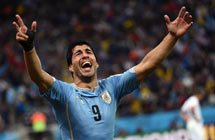 Suarez hits out at critics after sinking England