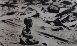 A child wounded in an explosion by Japanese troops in Shanghai