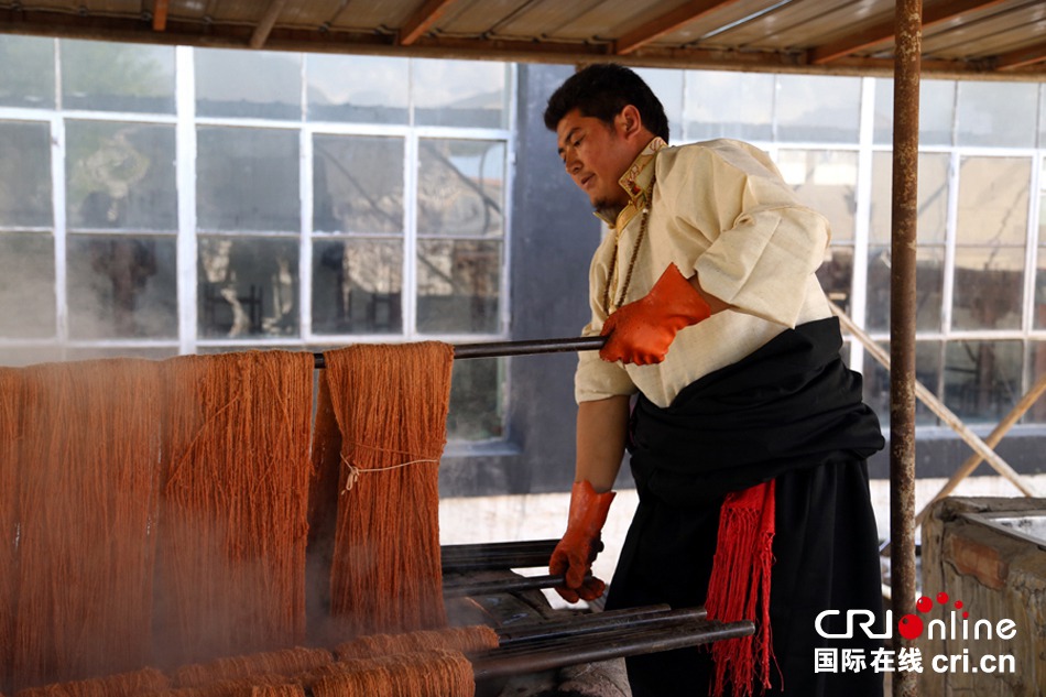 Legend on fingertip: the birth of a Tibetan carpet