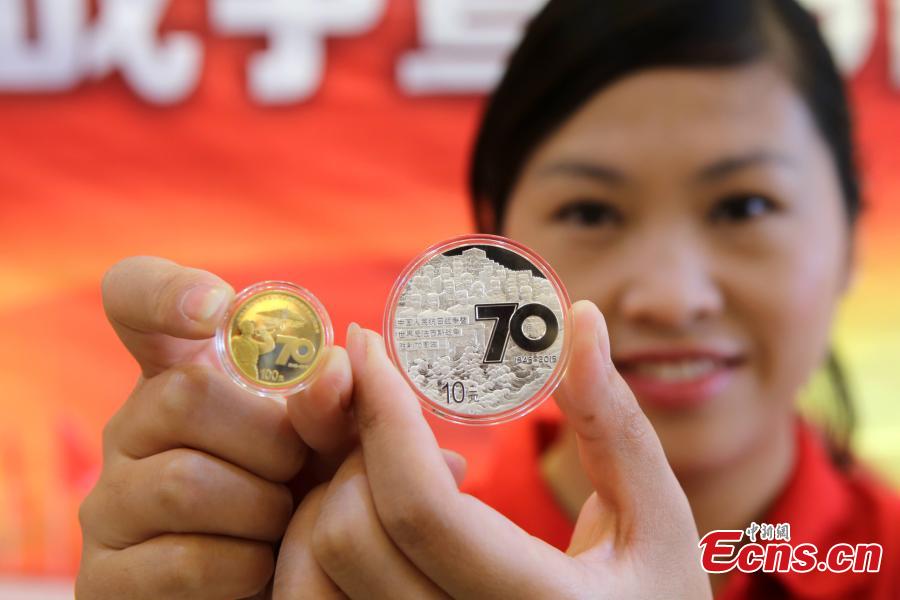 Commemorative coins for war anniversary debut in C China city