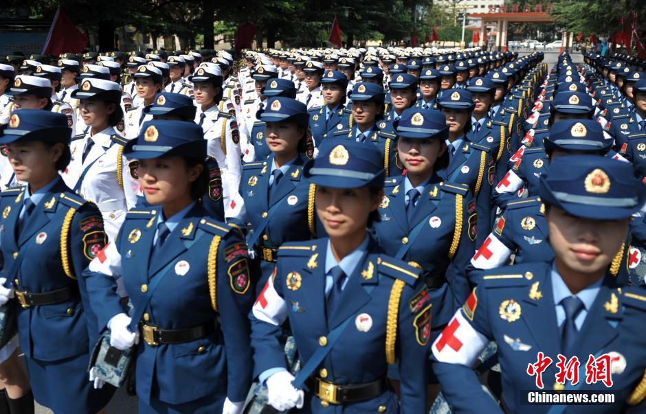 Female soldiers return to school after V-Day parade