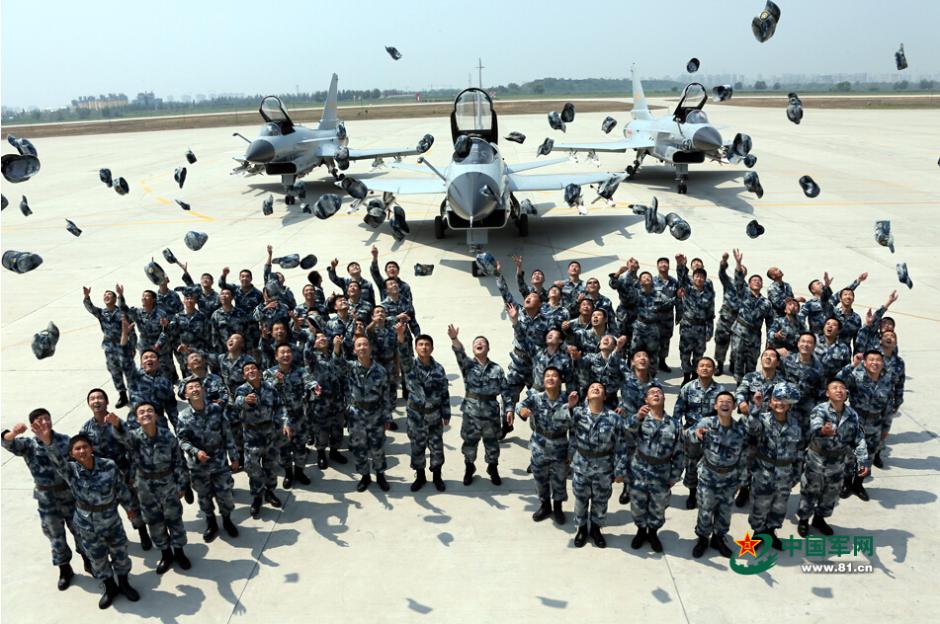 Pilots attending V-Day parade take group photos with their planes