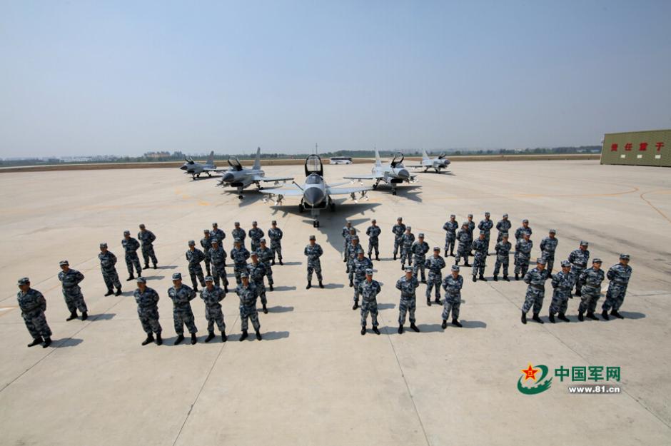 Pilots attending V-Day parade take group photos with their planes