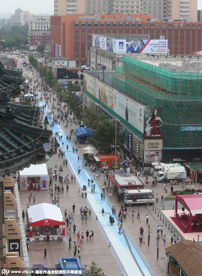 World's largest 3D ground painting unveiled in Beijing