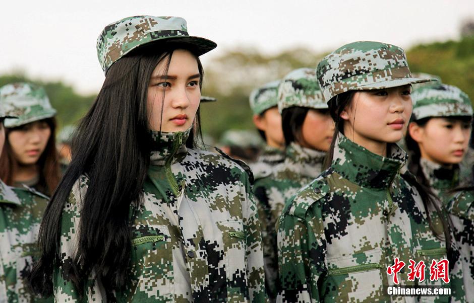 Charming girls attend military training