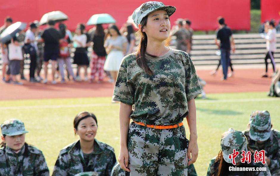 Charming girls attend military training