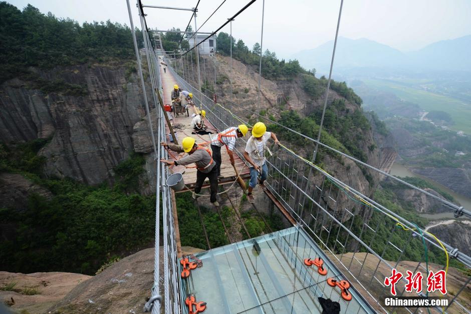 Photo story: a peek at constructors of a suspension bridge