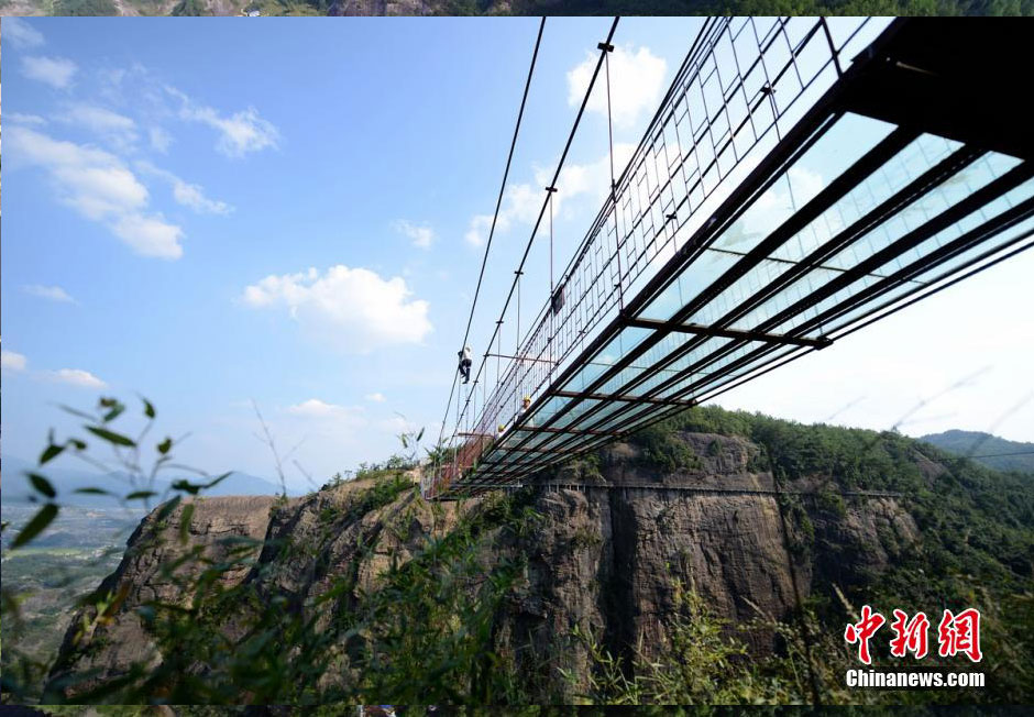 Photo story: a peek at constructors of a suspension bridge