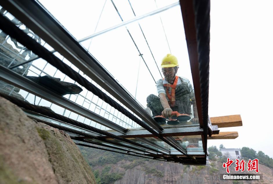 Photo story: a peek at constructors of a suspension bridge