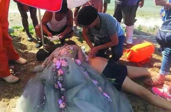 Bride-to-be tries to save drowned man while taking wedding photos