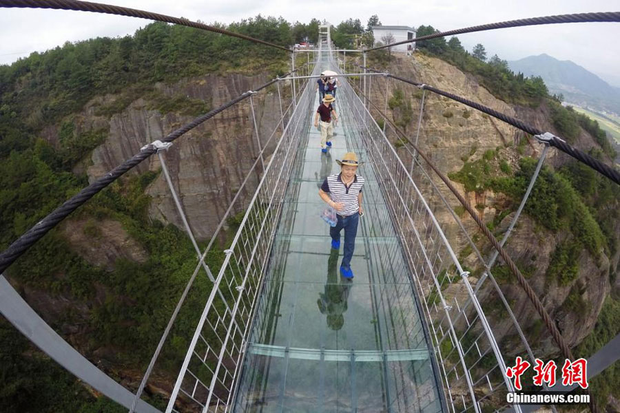 First Glass Suspension Bridge in China Opens to Visitors