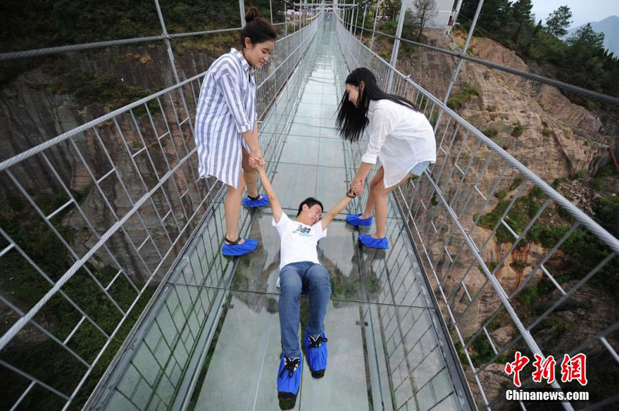 First Glass Suspension Bridge in China Opens to Visitors