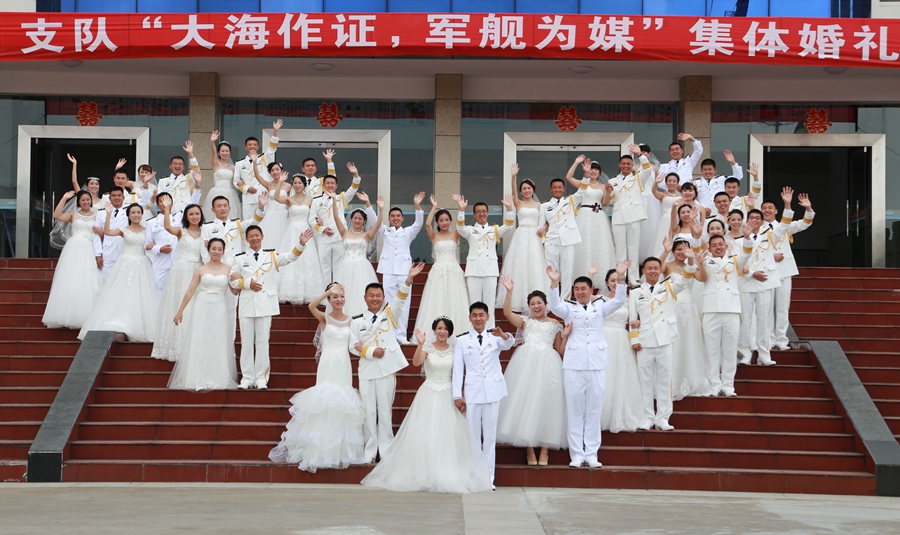 Group wedding ceremony held for 27 PLA soldiers