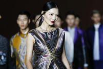 Fashion show staged in Forbidden City at night