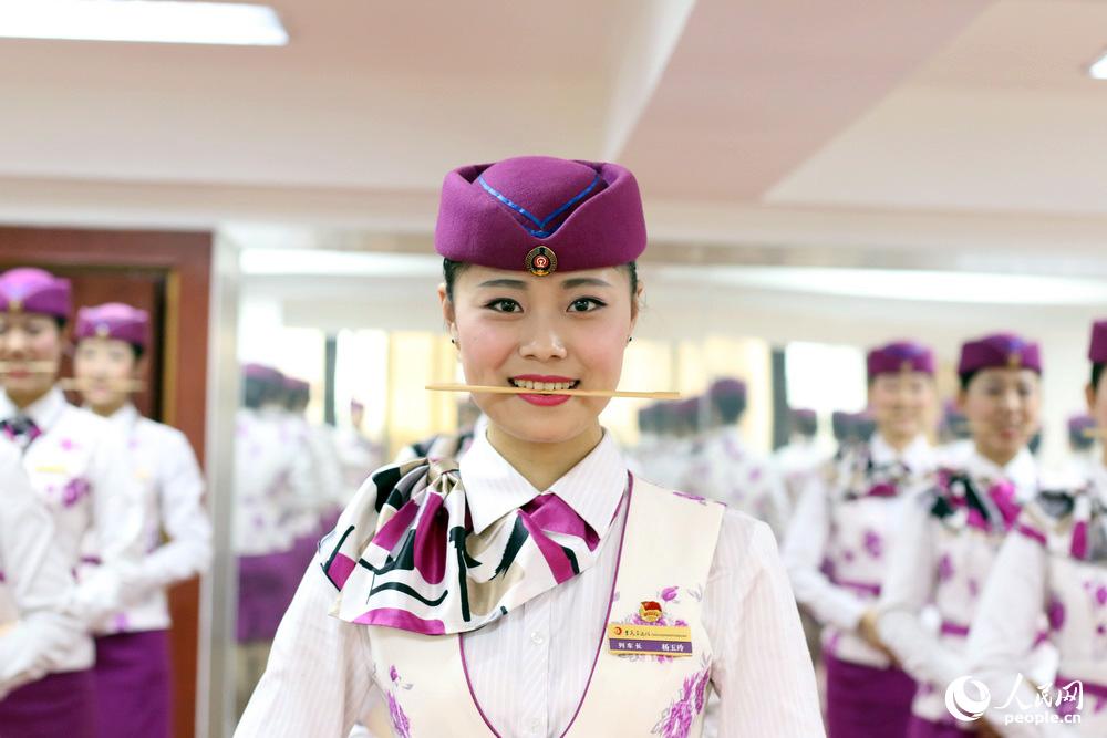 Train stewardesses receive harsh etiquette training 