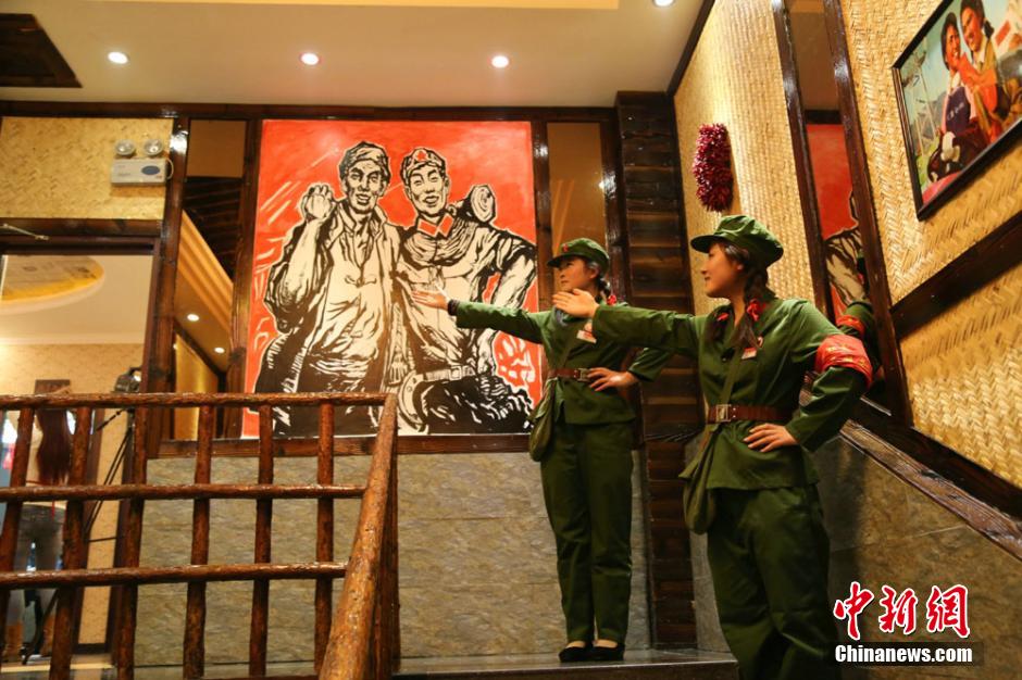 Waiters, waitresses dressed as Red Guards in restaurant in NW China