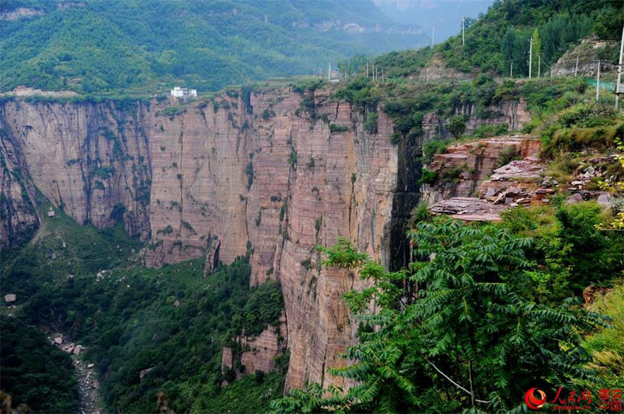 Spectacular perpendicular cliff of Xiyagou Valley