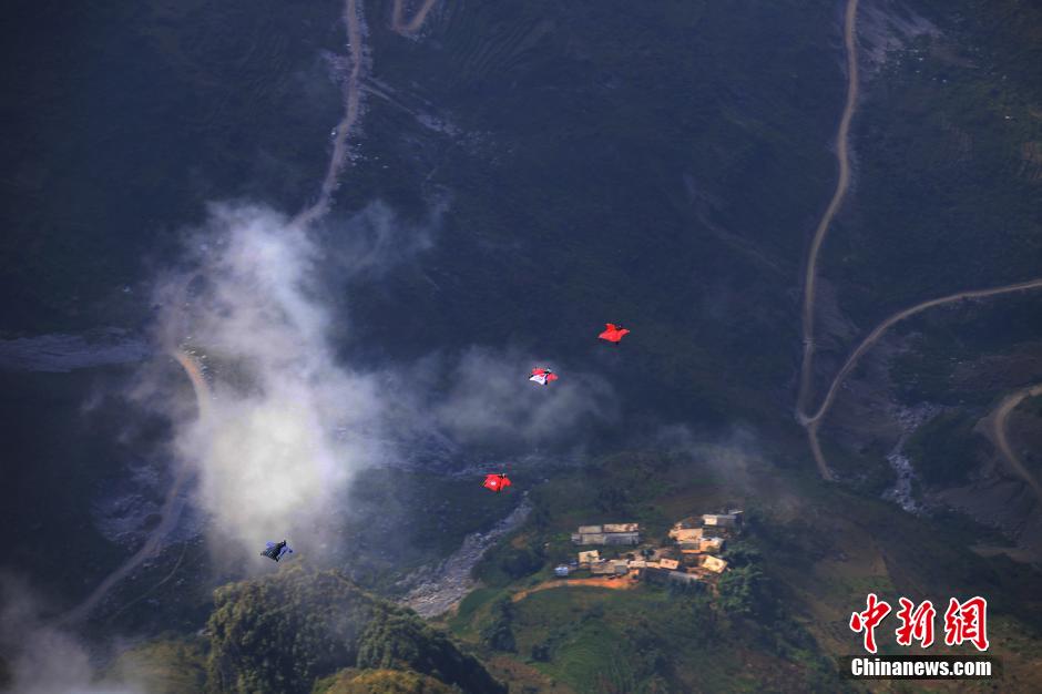 Wingsuit pilots fly in Zhaotong