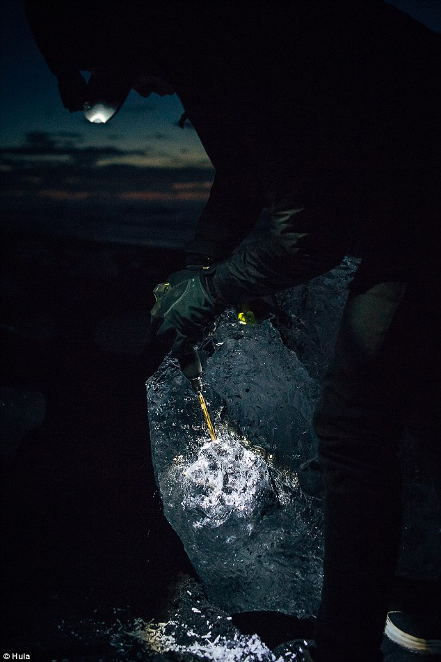 Artist creates stunning portraits of partially submerged women on melting icebergs 