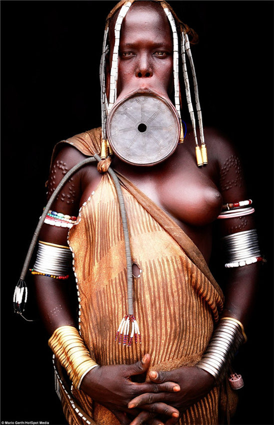 Photographer spends seven years taking intimate portraits of African tribes 