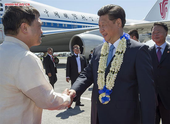 Obama visits Philippine vessel, eyes South China Sea at APEC