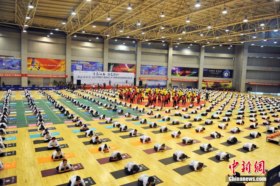 Thousands of people practice yoga in S China