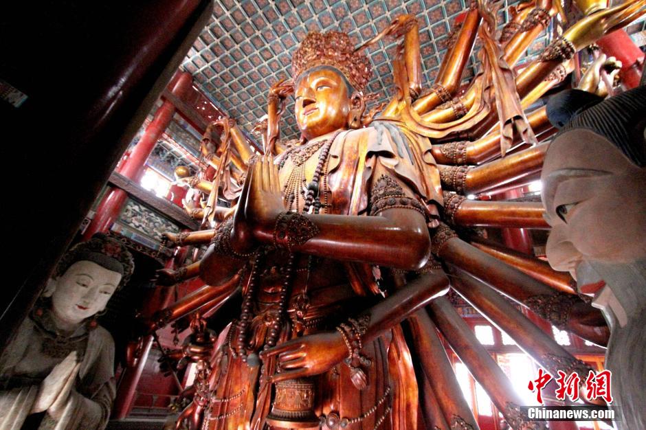 A glimpse of the world's biggest wooden Bodhisattva in N China