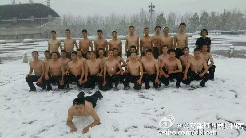 Half naked students take training in snow