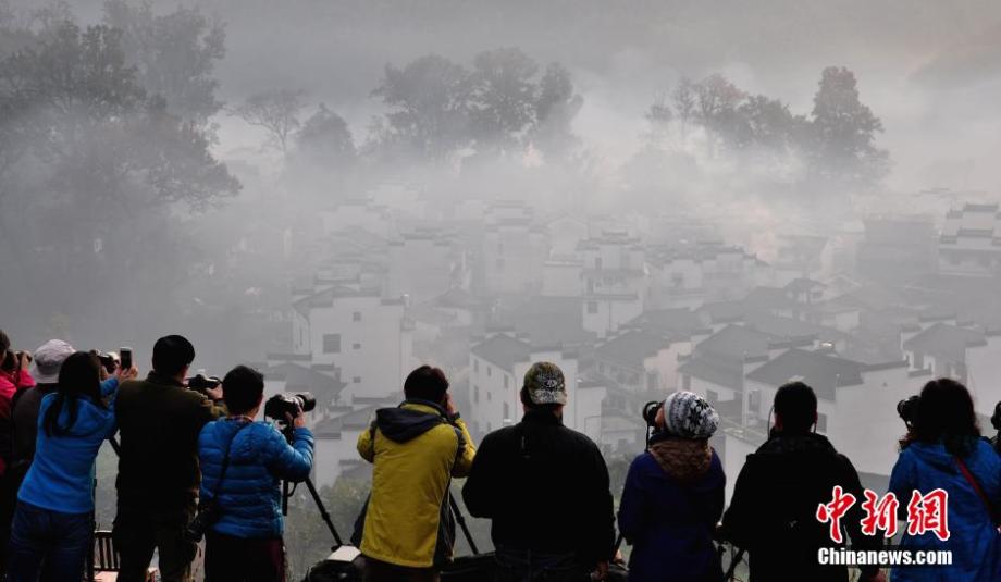 Chinese village shrouded in morning mist