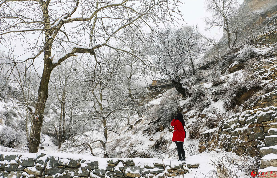 Hanging village on cliff after snow 