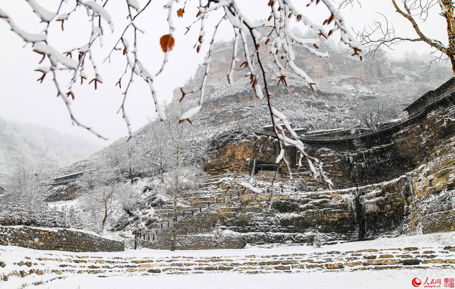 Hanging village on cliff after snow 