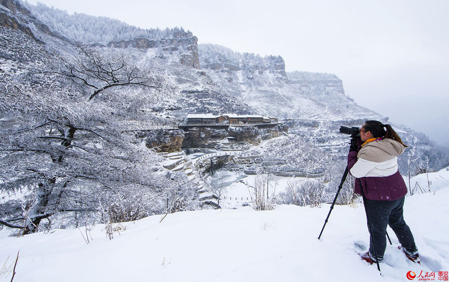 Hanging village on cliff after snow 