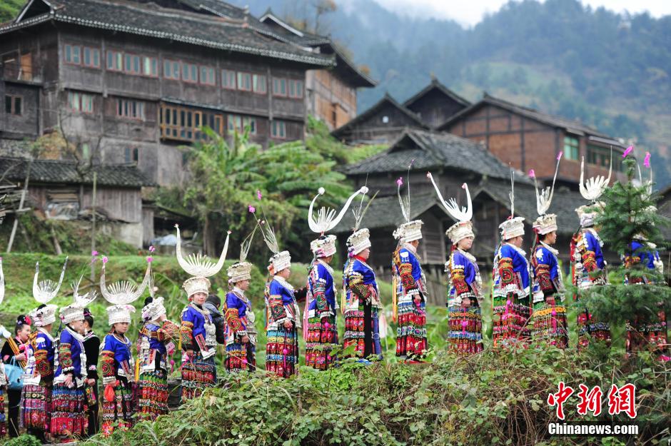 Married women of Miao ethnic group return home for New Year