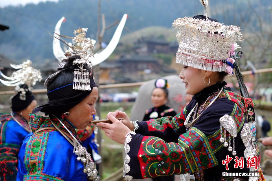 Married women of Miao ethnic group return home for New Year