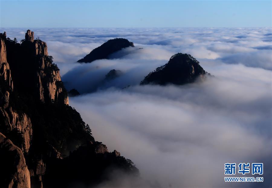 Incredible moments when cloud rolls over cliff tops like a waterfall