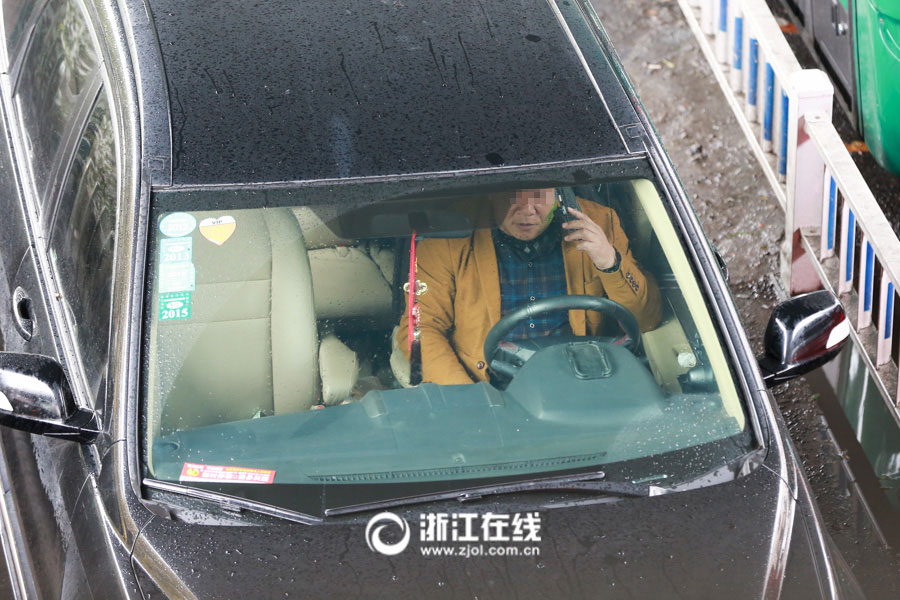 Watch out! Lovers cuddling as they drive a car
