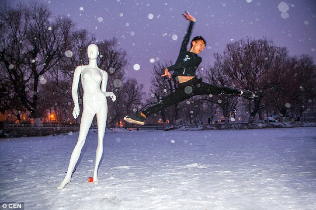 Teenager rises to fame after being spotted practicing with a mannequin for a dance competition