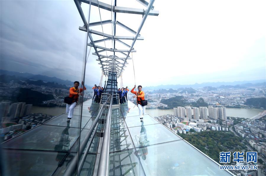 Glass skywalk built on top of skyscraper in S China