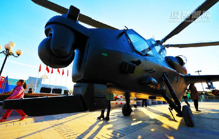 Drones, ballistic missile and armed helicopters shown in N China