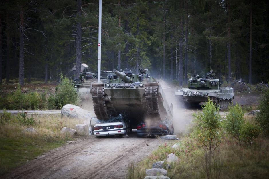 Terrific ways to reduce stress: crashing cars by tank