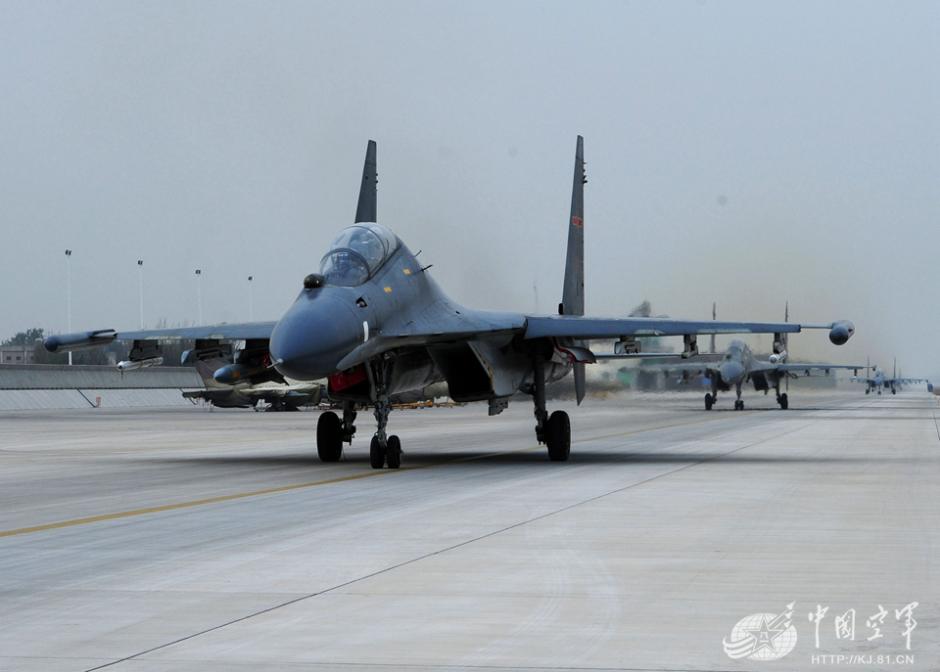 Su-30 fighter jets carrying anti-radiation missile conduct training in N China