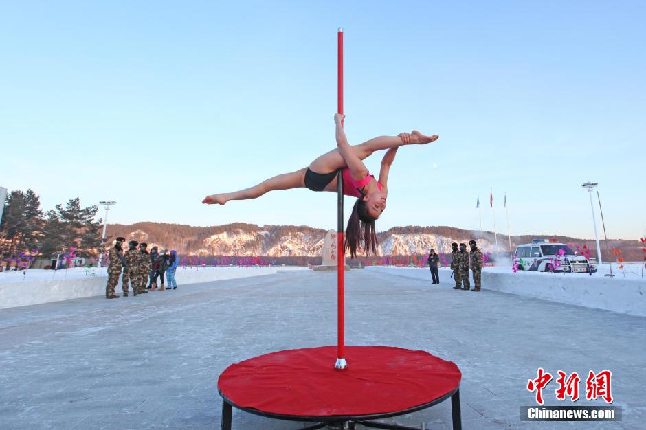 Pole dancers conduct winter training in NE China