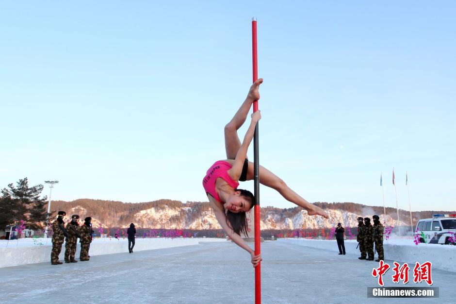 Pole dancers conduct winter training in NE China