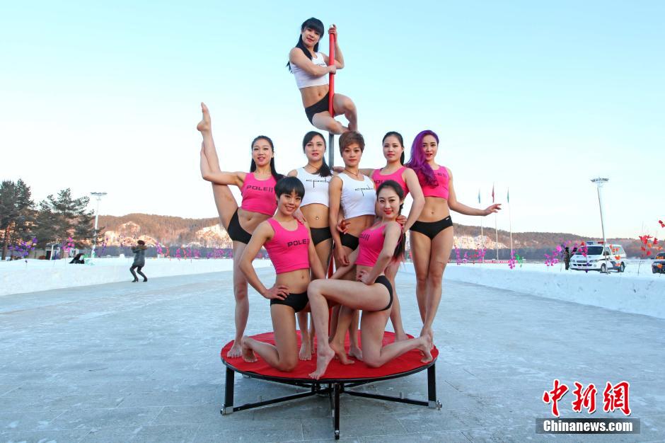 Pole dancers conduct winter training in NE China