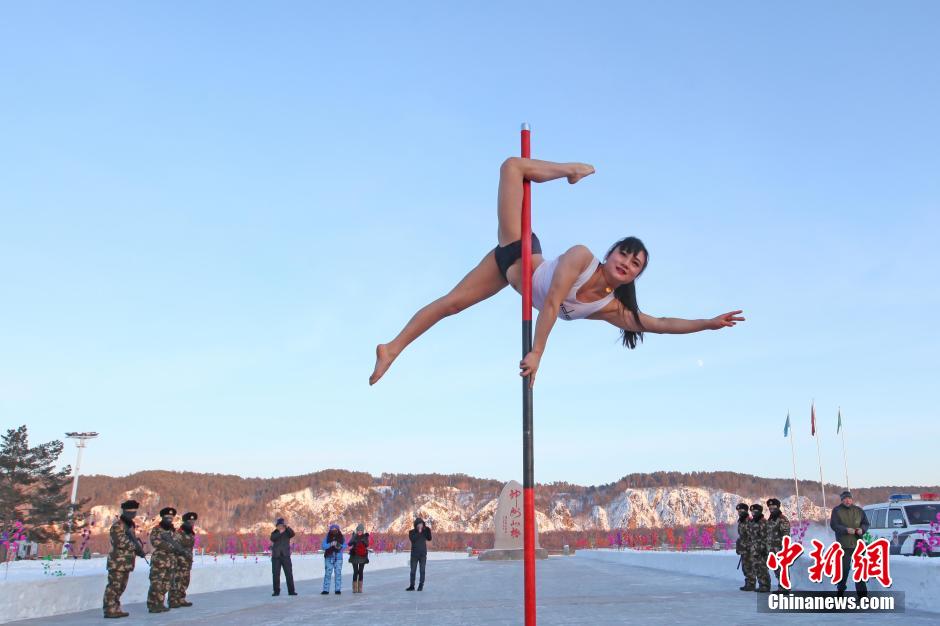 Pole dancers conduct winter training in NE China