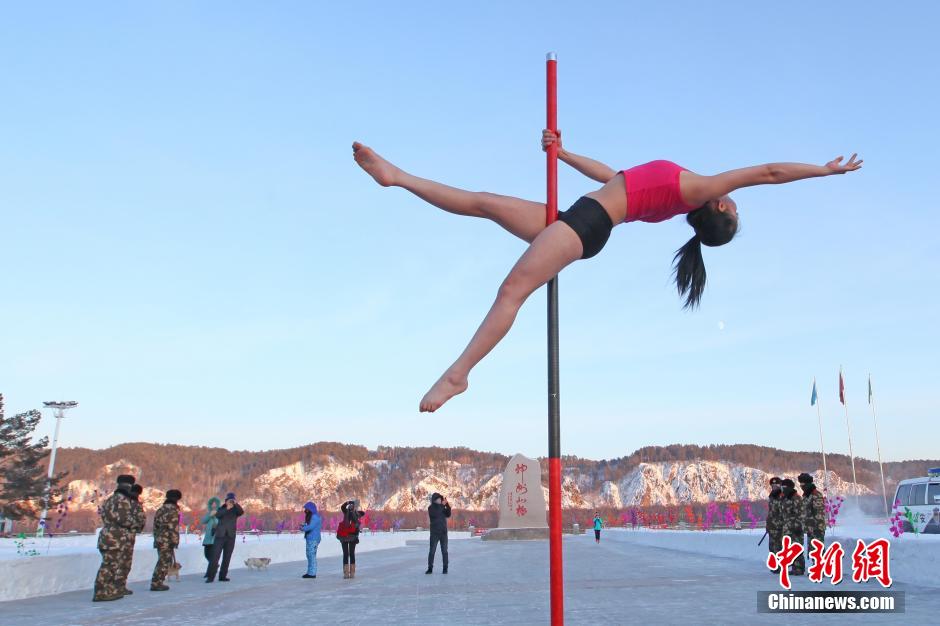 Pole dancers conduct winter training in NE China