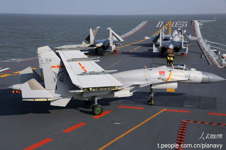 J-15 carrier-based fighters conduct training on the Liaoning