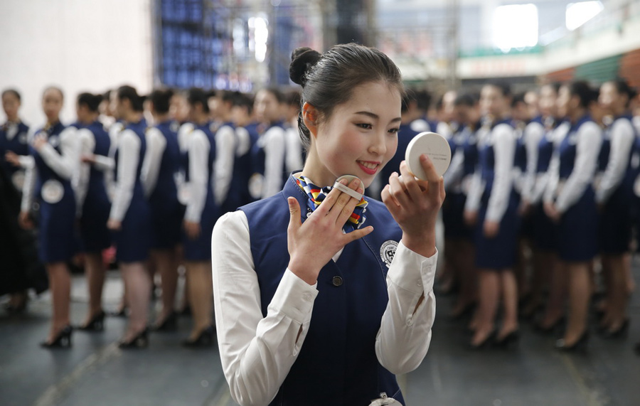 Retired female soldier trains hard to be flight attendant