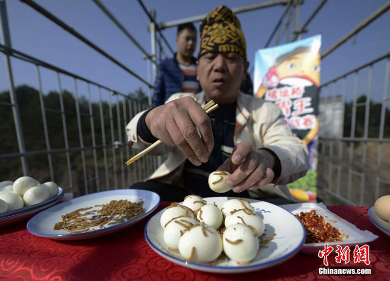 Competitive eater eats up 36 eggs with live worms in half an hour
