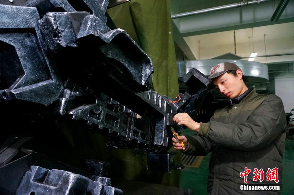 Teacher makes a robot in C China